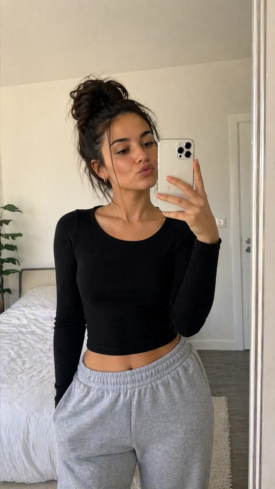 young woman video chatting on smartphone